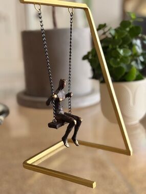 Swinging Figurine on Gold Stand Home Table Shelf Decor